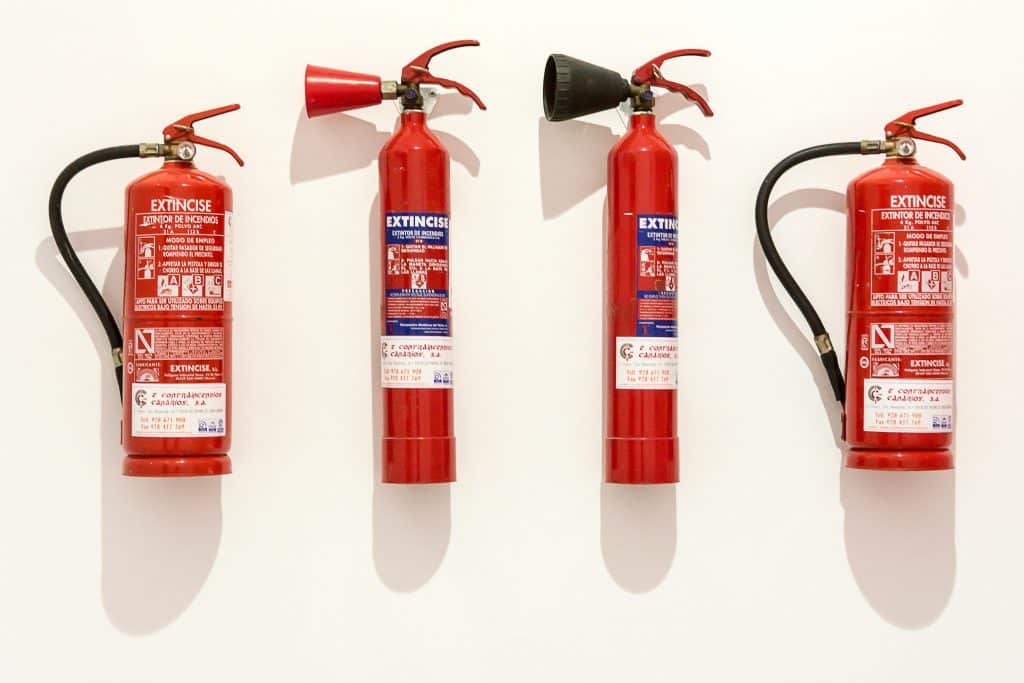 Four different fire extinguishers