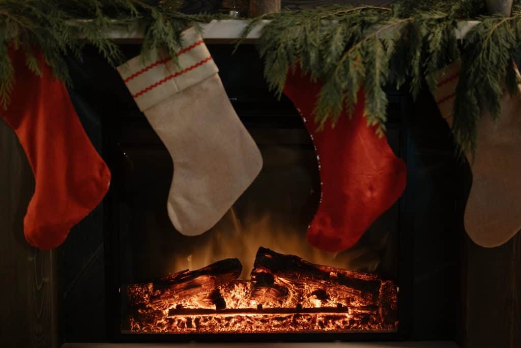 Christmas Stockings Hanging over a Fireplace