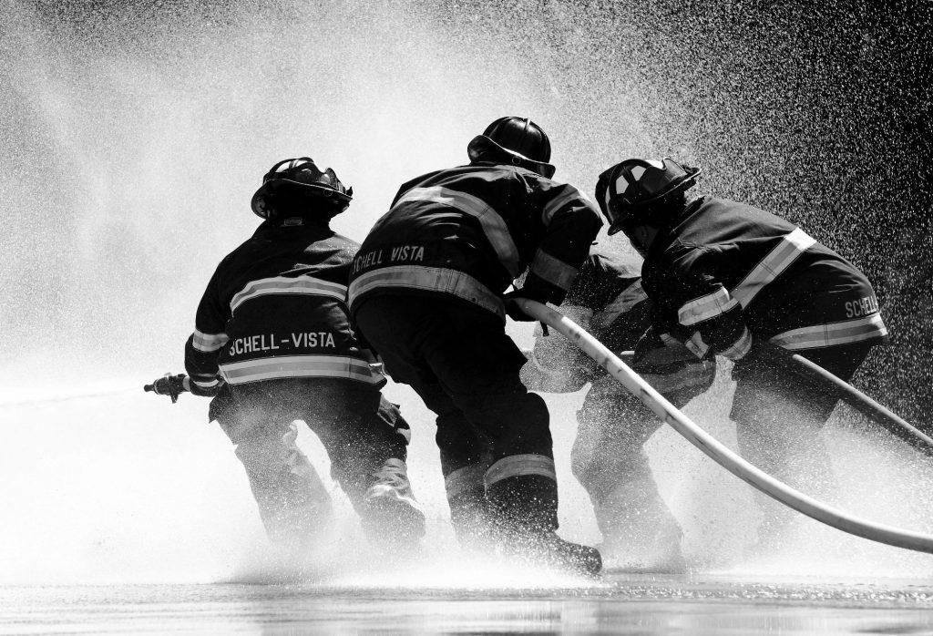 Black and white photo of firefighters
