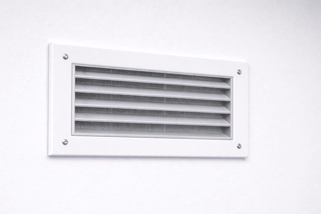 Fire grille on plain white wall