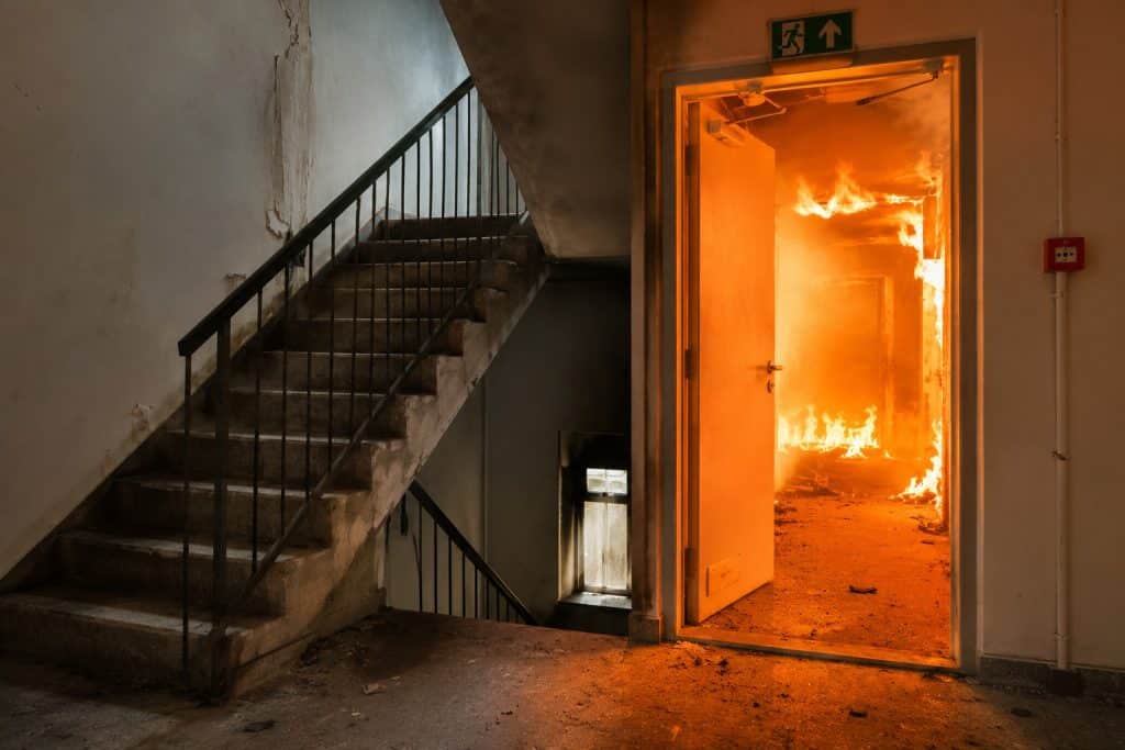 Fire and smoke in dark stairwell